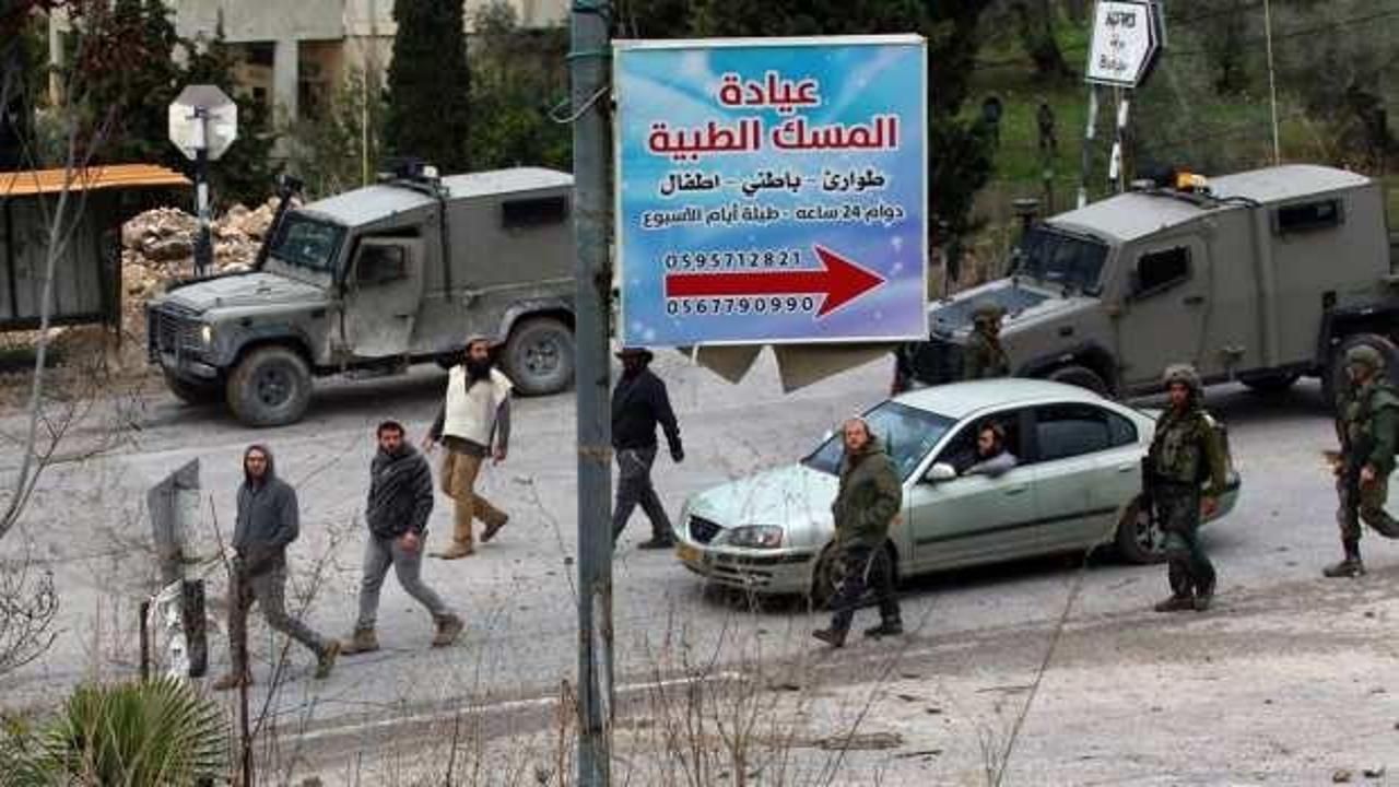 Yahudi işgalciler Batı Şeria’daki Muğir beldesine baskın düzenleyerek evlere ateş açtı